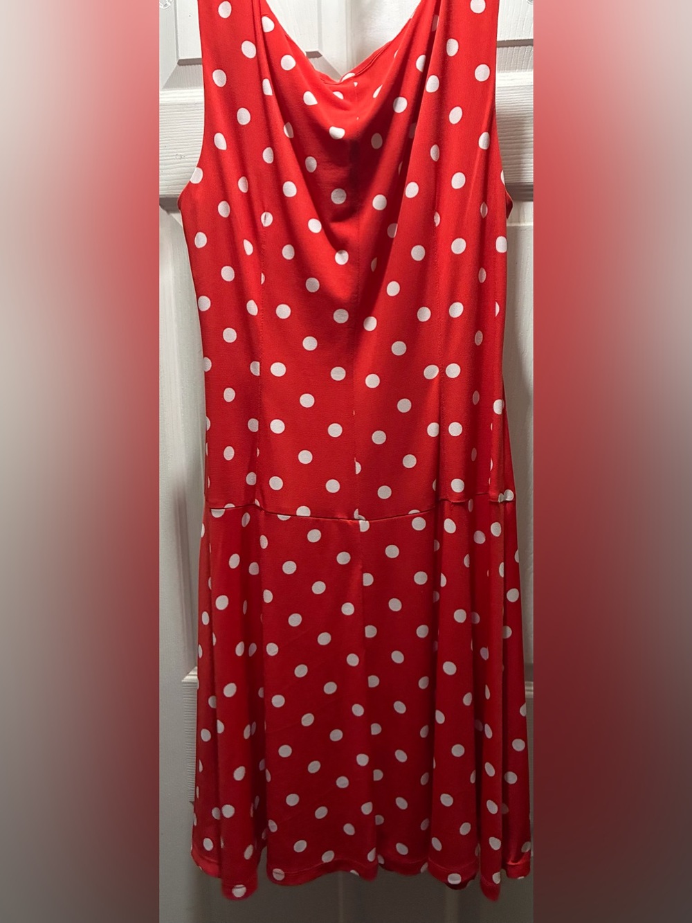 Red sleeveless dress with white dots.